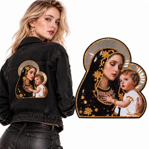 May include: A black denim jacket featuring a large, decorative sequined patch on the back. The patch depicts a woman in a black head covering holding a child, both rendered in intricate gold, black, and white sequins with a silver halo border.