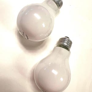 Bombillas halógenas Philips A19 de luz blanca cálida (paquete de 2), 100 vatios, 72 W de ahorro de energía.