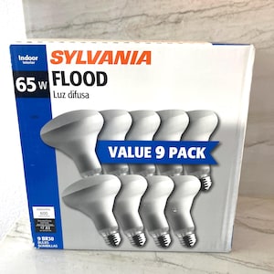 May include: A Sylvania 9-pack of 65W indoor flood light bulbs in a white and blue cardboard box. The packaging features the text Sylvania Flood, Value 9 Pack, 120V, 600 lumens, and 9 BR30 bulbs. The box displays images of the white light bulbs.