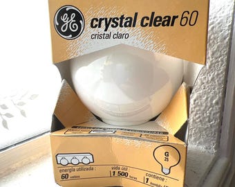 Bombilla GE G25 tipo globo de 60 W, 1 unidad, luz blanca cálida, incandescente, base mediana.