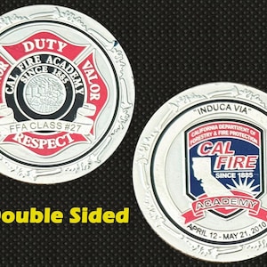 May include: Double-sided silver coin featuring the Cal Fire Academy logo. One side displays "Duty, Honor, Valor" and "FFA Class #27 Respect." The other side shows the California Department of Forestry & Fire Protection logo.