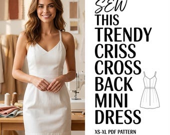 May include: A woman wearing a white mini dress with a V-neck and spaghetti straps. The dress has a criss-cross back design. Text on the right side reads "SEW THIS TRENDY CRISS CROSS BACK MINI DRESS" and "XS-XL PDF PATTERN".