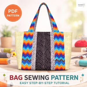 May include: A colorful tote bag with a patchwork design. The bag features a central black panel with a leaf pattern, flanked by patterned fabric and a vibrant zigzag pattern in blue, orange, and yellow. The handles also have the zigzag pattern. The text "BAG SEWING PATTERN" is at the bottom.