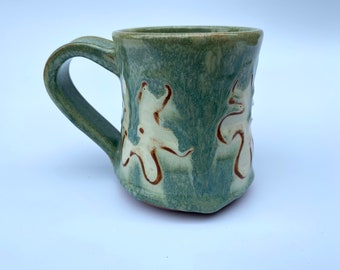 Green Hand-thrown mug with ivory flower