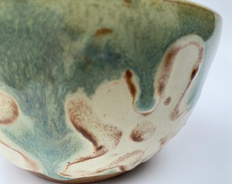 Ceramic Green bowl with off white flower and trail slip detail