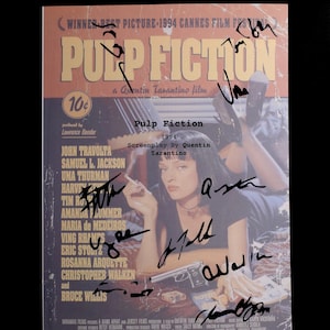 May include: A vintage movie poster for "Pulp Fiction" featuring signatures. The poster has a retro design with the film's title and credits. The image includes a woman holding a cigarette and a gun.