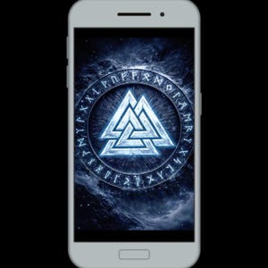 May include: A white smartphone displays a glowing blue Valhalla symbol against a dark, textured background. The symbol is a stylized triangle with runes around the perimeter. The phone is set against a black backdrop.