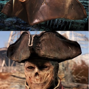 May include: A brown leather pirate hat with a stitched 'X' on the front. The hat is worn by a character with a skull-like face and a red jacket.