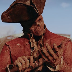 May include: A skeletal figure wearing a red coat and a tricorn hat holds a small object in their hands. The figure is standing in a field of tall grass.