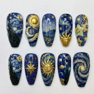 May include: A collection of ten artificial nails, each decorated with a different design inspired by Van Gogh's "Starry Night." The designs feature swirling blues, gold accents, and celestial elements. The nails are almond-shaped.