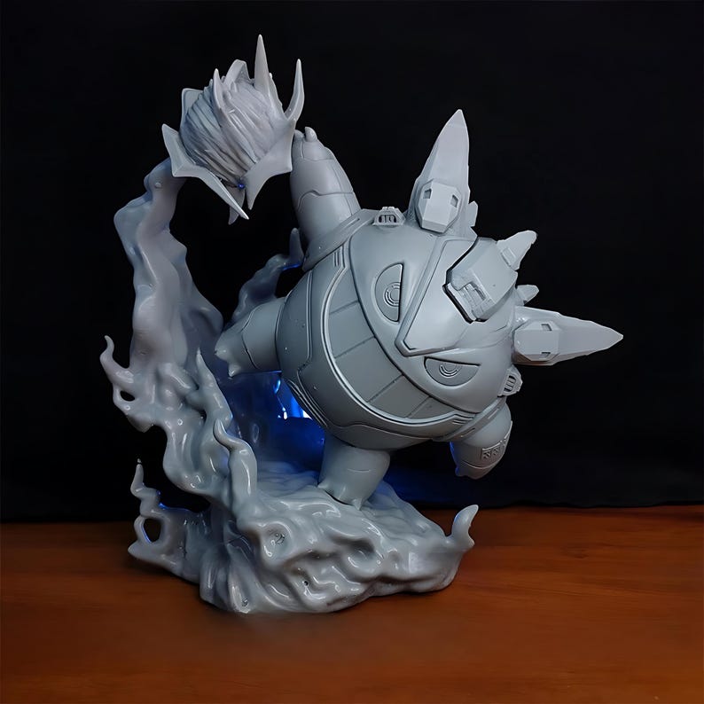 May include: A gray, stylized figurine of a creature with a spiky shell and pointed appendages. The figurine is posed dynamically, with a flowing, cloud-like base and a flower-like element above. The base has a blue light.