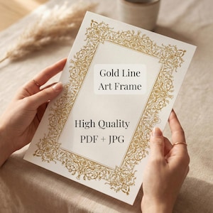May include: A cream-coloured art print with a gold filigree border is held by two hands. The print features the text "Gold Line Art Frame" and "High Quality PDF + JPG". The design is ornate and elegant.