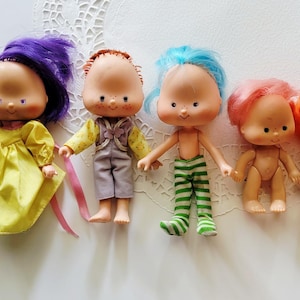 Set of 7 Vintage Strawberry Shortcake American Greetings Dolls 1980s Rescue TLC Dolls, Includes Rare Almond Tea Doll