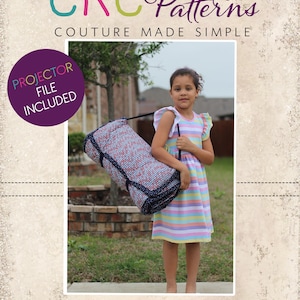 May include: A girl carries a rolled-up mat with a red and blue pattern. She wears a striped dress. The image includes the text "CKC Patterns Couture Made Simple" and "CKC Home". A purple circle reads "Projector File Included".