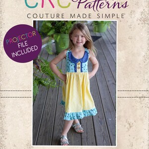 May include: A yellow and blue dress with a white collar and buttons. The dress has a blue and white print with small white flowers. The dress is being worn by a young girl with long blonde hair. The image includes the text "CKC Patterns Couture Made Simple" and "CKC Kids".