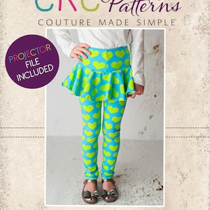 May include: A girl wearing blue leggings with green heart patterns and a matching green heart patterned skirt. The skirt has a ruffled hem. The image includes the text "CKC Patterns Couture Made Simple" and "CKC Kids".