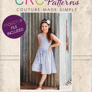 May include: A young girl wearing a striped blue and white dress with a white headband and a flower on it. She is standing next to a metal wall with a distressed look. The text "CKC Patterns Couture Made Simple" is at the top of the image and "CKC Kids" is at the bottom of the image. A purple circle with the text "Projector File Included" is in the top left corner of the image.