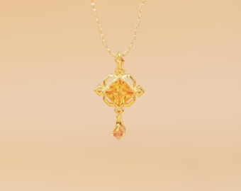 Colgante Zhongli Genshin Impact de plata de ley S925 bañado en oro con zafiro de laboratorio naranja, diseño original