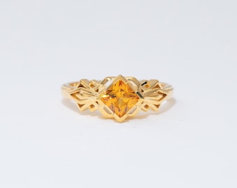 Anillo Zhongli Genshin Impact de plata de ley S925 bañado en oro con zafiro de laboratorio naranja, diseño original
