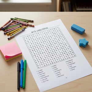 May include: A word search puzzle titled "#75 UNICORNS" with a list of words to find. Crayons, sticky notes, pens, a blue eraser, and a star-shaped object are on a wooden surface.