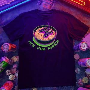 May include: A set of three ceramic mugs with a speckled, matte finish. The mugs are in shades of cream, light gray, and dark gray. Each mug has a simple, minimalist design, perfect for coffee or tea.