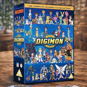 May include: A DVD box set of the animated series "Digimon," featuring the complete seasons 1-4. The box is blue with character illustrations and the show's logo. Three DVDs are visible in front of the box.