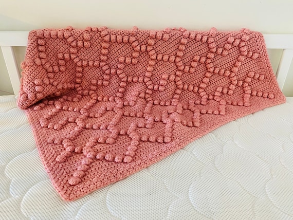Pink bobble blanket deals
