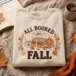 Cozy Autumn Book Sweatshirt, Embroidered Fall Crewneck with Books, Pumpkin, Candle, Coffee and Botanical Leaves for Avid Readers Everywhere