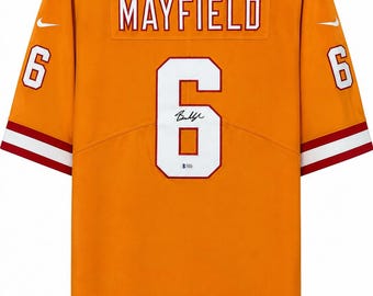 Camiseta naranja de la NFL firmada por Baker Mayfield con certificado de autenticidad de Beckett.