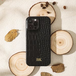 May include: A handmade wooden sign with the text "Welcome to our home" in a handwritten style. The sign is painted white with black lettering and a distressed finish, perfect for home decor.