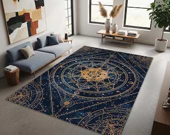 May include: A large, rectangular area rug with a celestial design. The rug features a dark blue background with gold-colored geometric patterns, stars, and celestial symbols. The rug is placed in a modern living room setting with a blue sofa and large windows.