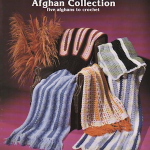 May include: A crochet pattern book titled "Mile-A-Minute Afghan Collection: five afghans to crochet". The cover features five crocheted afghans in various colors and patterns draped over a chair.