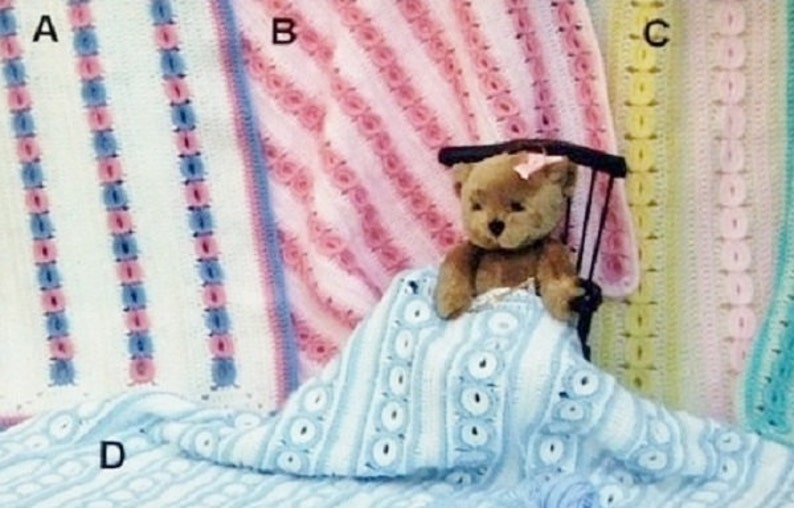 May include: Four crocheted blankets labelled A, B, C, and D. Blanket A is white with pink and blue stripes. Blanket B is pink with textured rows. Blanket C is yellow and green. Blanket D is light blue with white circular patterns, covering a teddy bear.