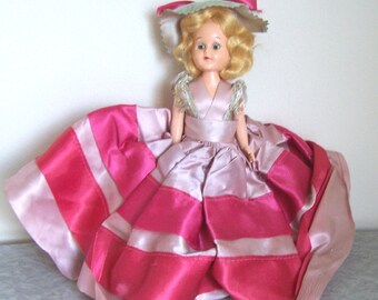 Vintage 50s doll in fancy dress - moveable plastic with open and close eyes