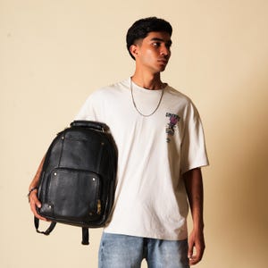 Schwarzer Lederrucksack mit Taschen - Reisen Arbeit Alltag Professioneller Tagesrucksack UniStudent Business