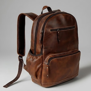May include: A brown leather backpack with multiple zippered compartments and adjustable shoulder straps. The bag features a top handle and a side pocket. The leather has a distressed appearance.