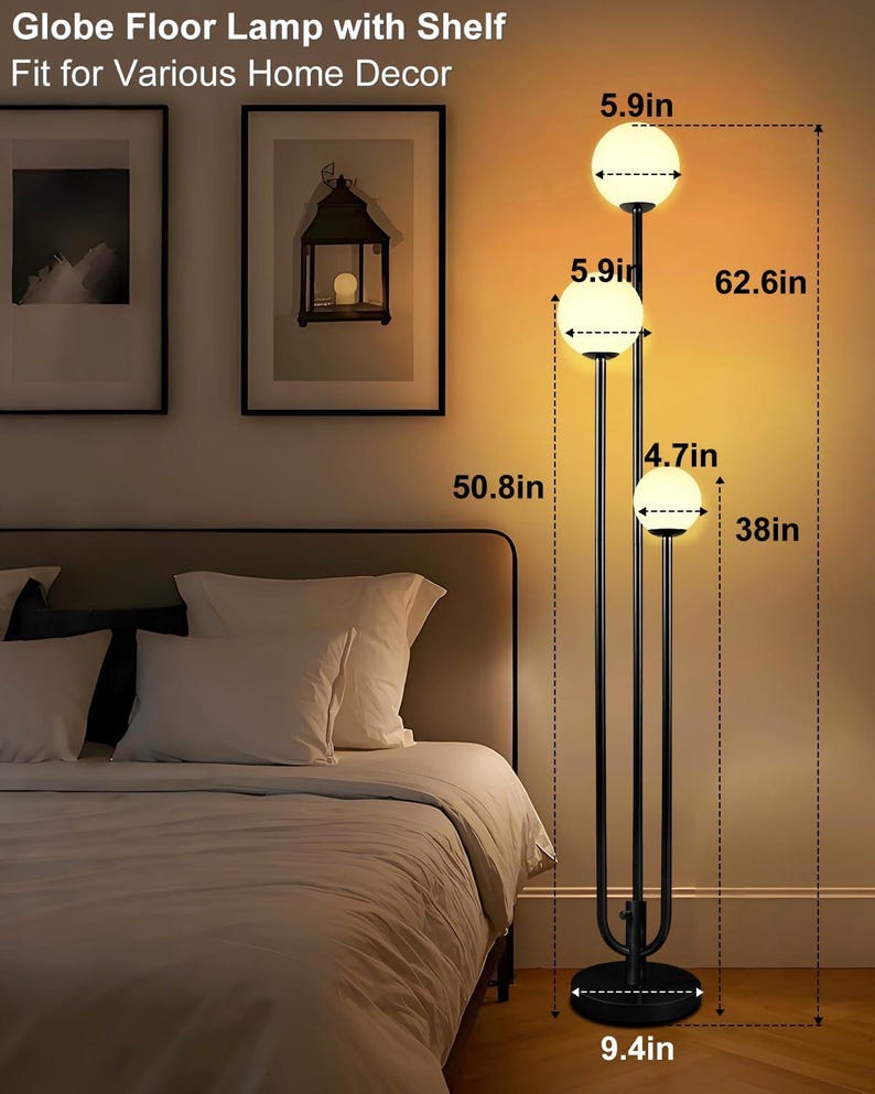May include: A black globe floor lamp with three spherical lights. The lamp is 62.6 inches tall and has a base that is 9.4 inches in diameter. The text on the image reads "Globe Floor Lamp with Shelf Fit for Various Home Decor."