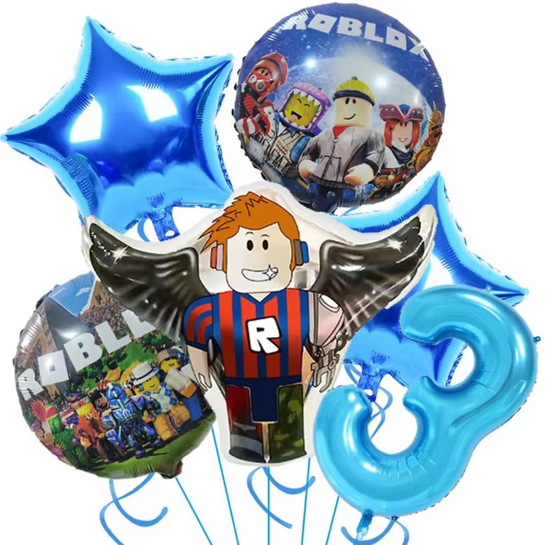 May include: A collection of blue foil balloons, including a star, a number 3, and two round balloons featuring Roblox characters and logos. The central balloon is shaped like a Roblox character with wings. Perfect for a birthday party.