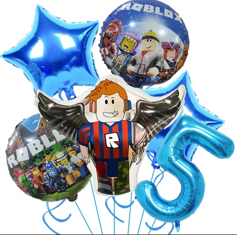 May include: A collection of blue foil balloons, including a star, a number 5, and two round balloons with Roblox characters. One balloon features a Roblox character with wings. Party decorations.