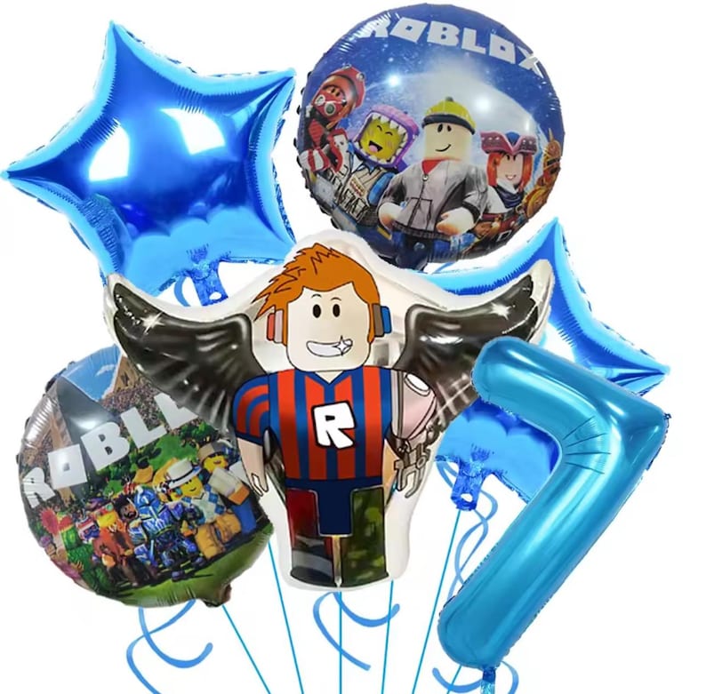 May include: A collection of blue and character-themed balloons. Includes a star-shaped balloon, a number 7 balloon, and several round balloons featuring characters and the word "ROBLOX". The central balloon is a character with wings.