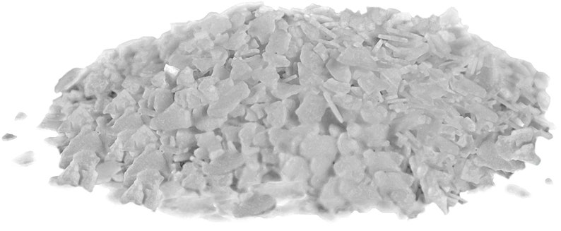 May include: A close-up of a pile of white, flaky sea salt crystals.