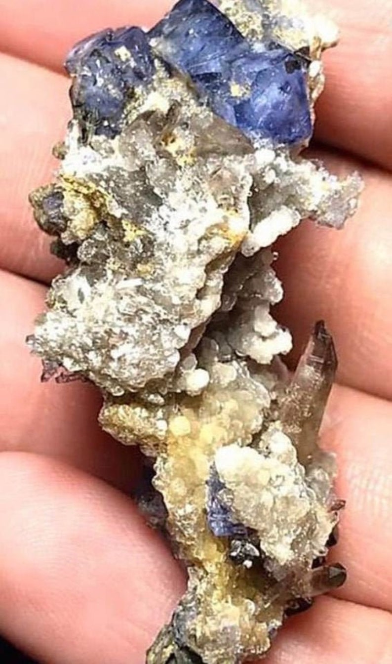 Purple Fluorite Crystals on the Matrix