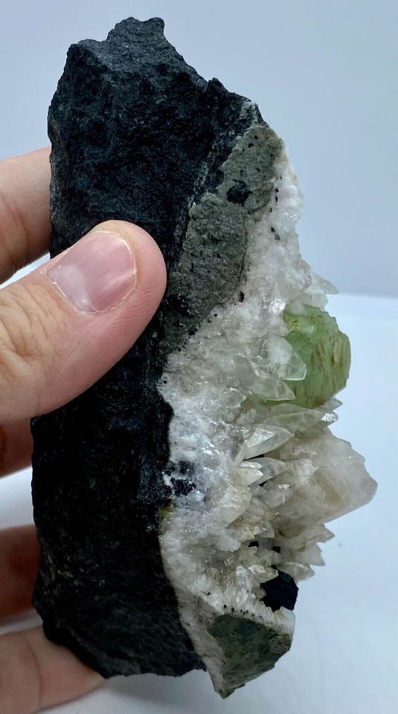 Babingtonite Crystals and Calcite Crystals on the Matrix Prehnite Botryoidal Crystal