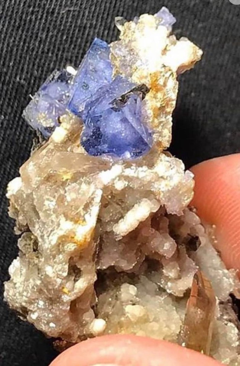 Purple Fluorite Crystals on the Matrix