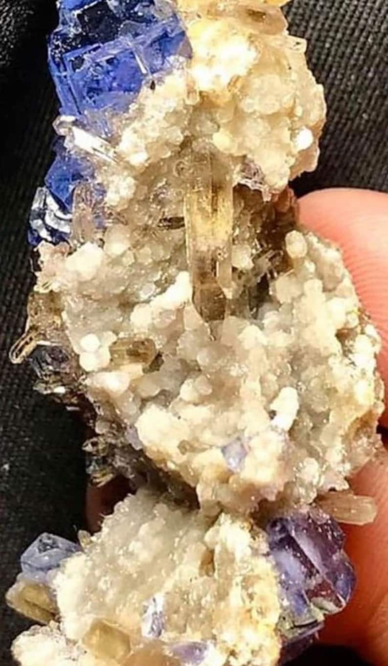 Purple Fluorite Crystals on the Matrix