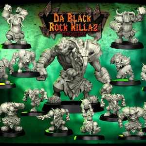 May include: A collection of gray miniature figurines of Orc-like creatures, some with raised arms, on black bases with green accents. The text "Da Black Rock Killaz" is visible at the top. A red circular logo is in the bottom right corner.