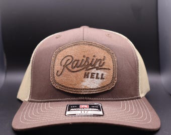 Raisin’ Hell Leather Patch Trucker Hat – Western Cowboy Cap