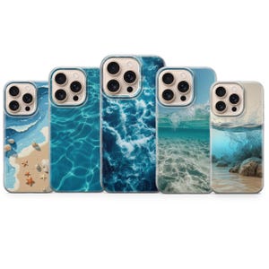 May include: A collection of five phone cases with ocean-themed designs. The cases feature images of waves, sandy beaches, and underwater scenes in shades of blue, beige, and white. Each case has a clear border and a camera cutout.