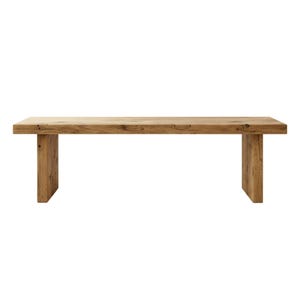 Puede incluir: Una mesa rectangular de madera con acabado natural. La mesa tiene una tapa gruesa y dos patas rectangulares robustas. La veta de la madera es visible, dando a la mesa un aspecto r&uacute;stico. La mesa mide aproximadamente 183 cm de largo.