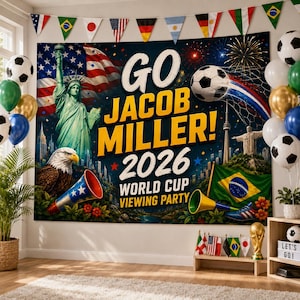 May include: A large rectangular banner featuring the text GO JACOB MILLER! 2026 WORLD CUP VIEWING PARTY. The design includes the Statue of Liberty, a bald eagle, a soccer ball, a Brazilian flag, and fireworks against a dark blue night sky.